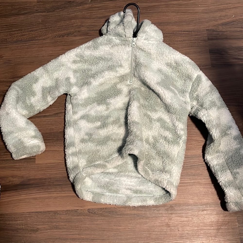 The brand is SO and it’s a very nice cozy/furry sweater